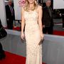 LOS ANGELES, CA - JANUARY 11:  Host/Actress Kaley Cuoco arrives at the 2012 People's Choice Awards at Nokia Theatre L.A. Live on January 11, 2026 in Los Angeles, California.  (Photo by Christopher Polk/Getty Images for PCA)